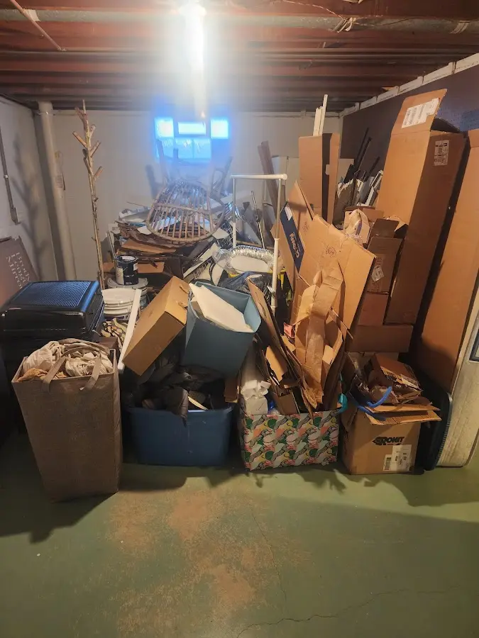 Roll-off dumpster container at job site for Concrete Dumpster Rental in Coral Gables